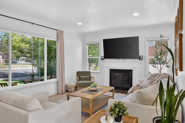 Bright living area with large picture windows providing abundant natural light