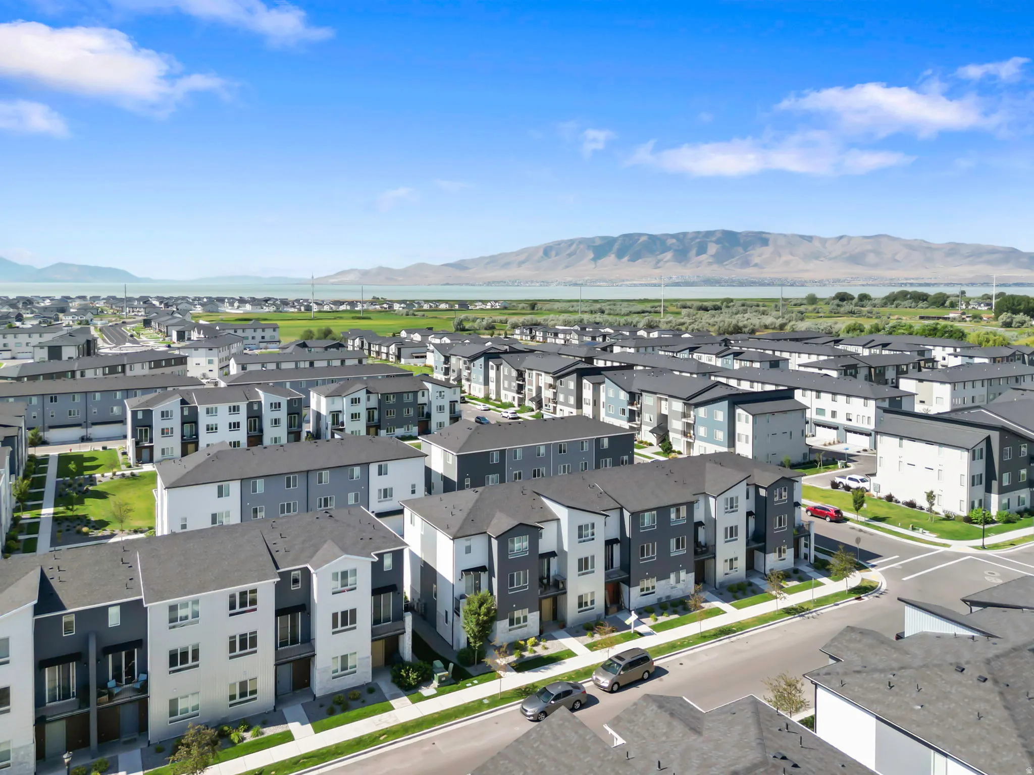 Aerial perspective showcasing a community of multi-story residential buildings