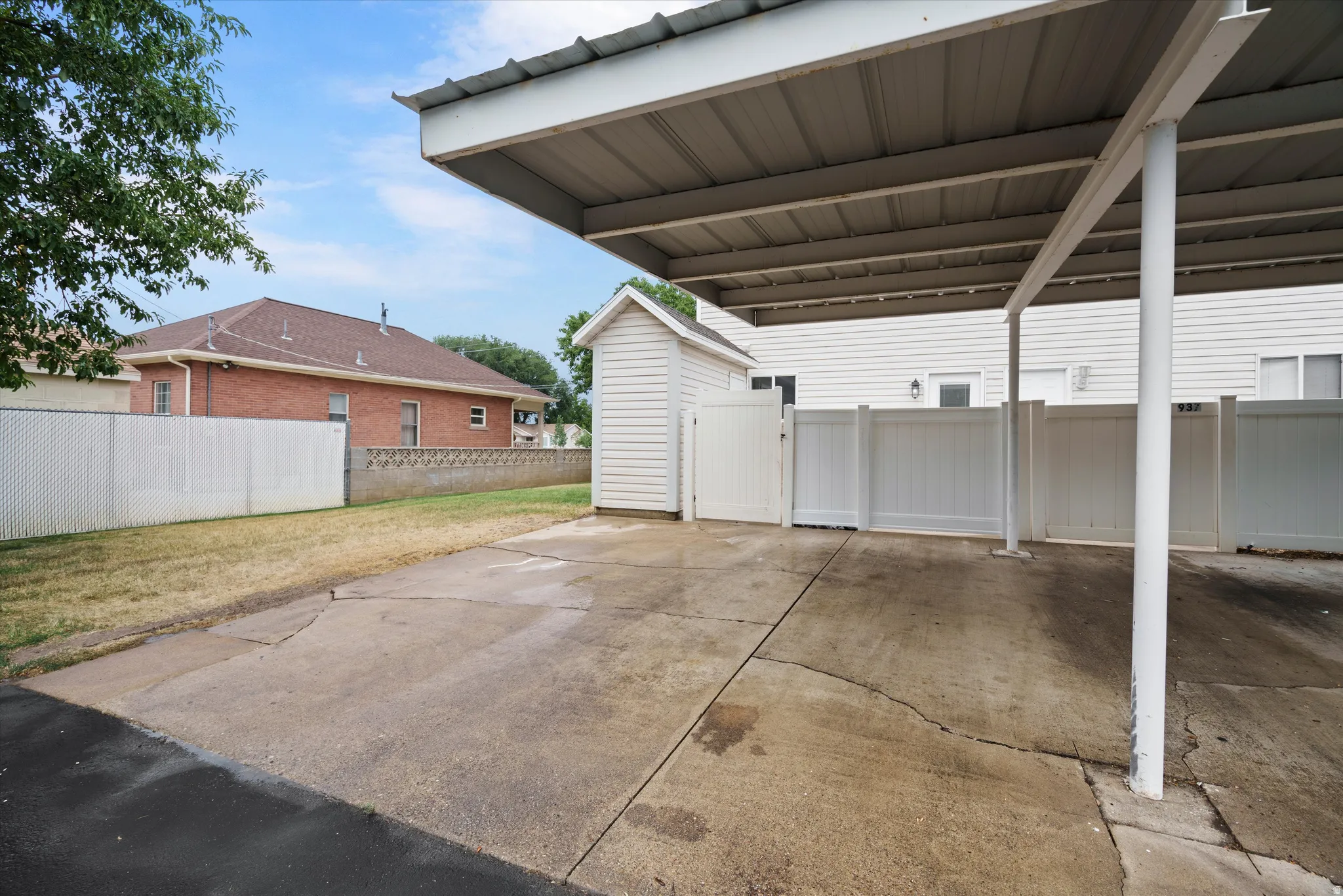 Parking right outside of fenced patio.