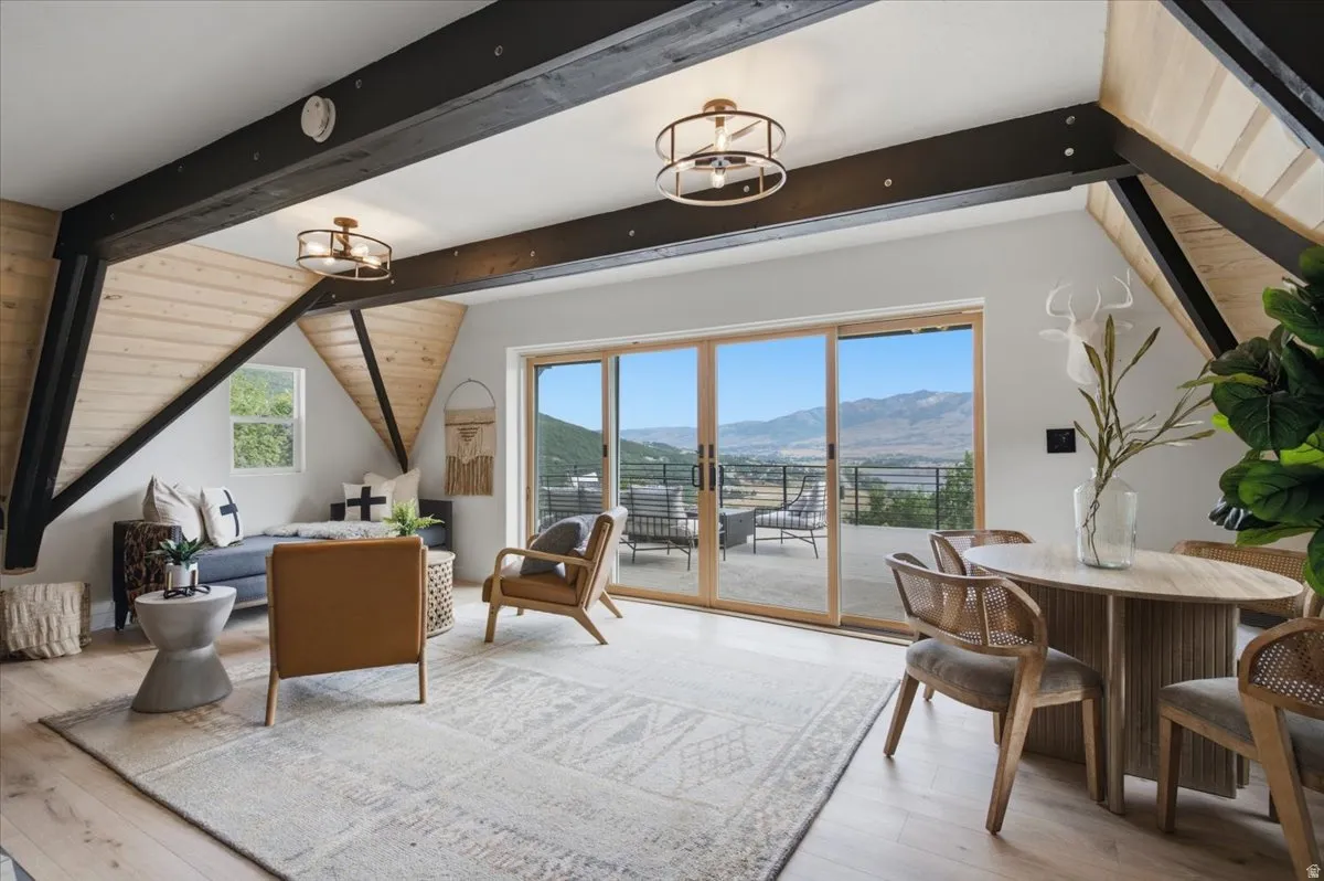 Expansive sliding glass doors open to an outdoor terrace