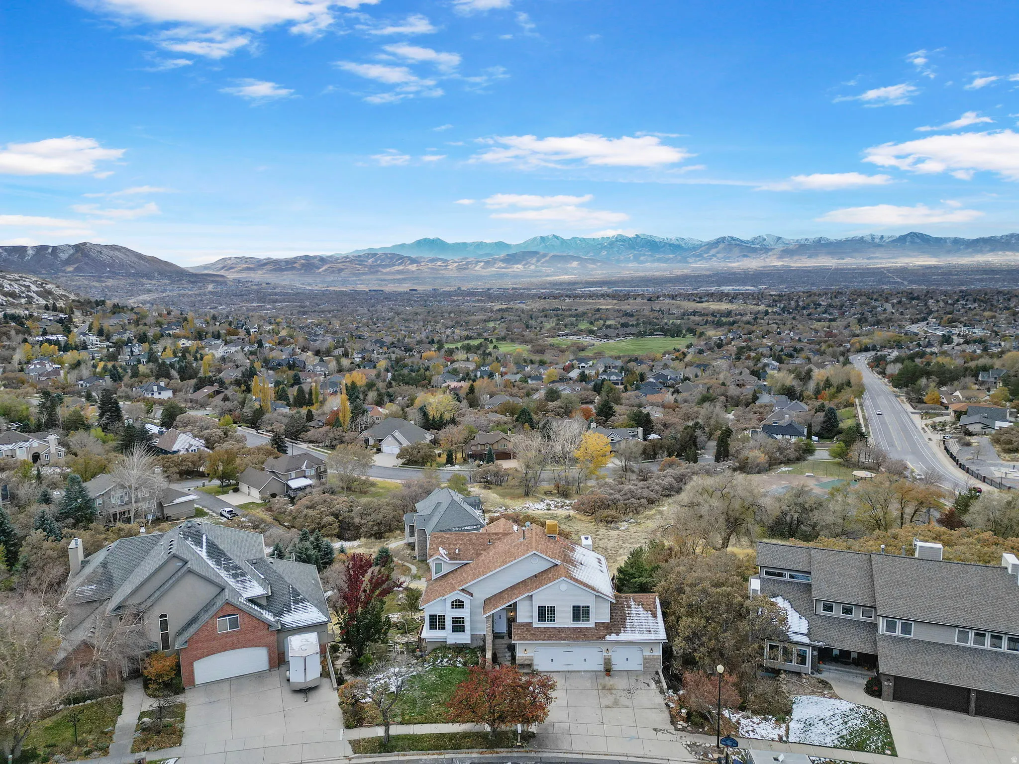 Aerial perspective showcasing a residential neighborhood with varied architectural styles