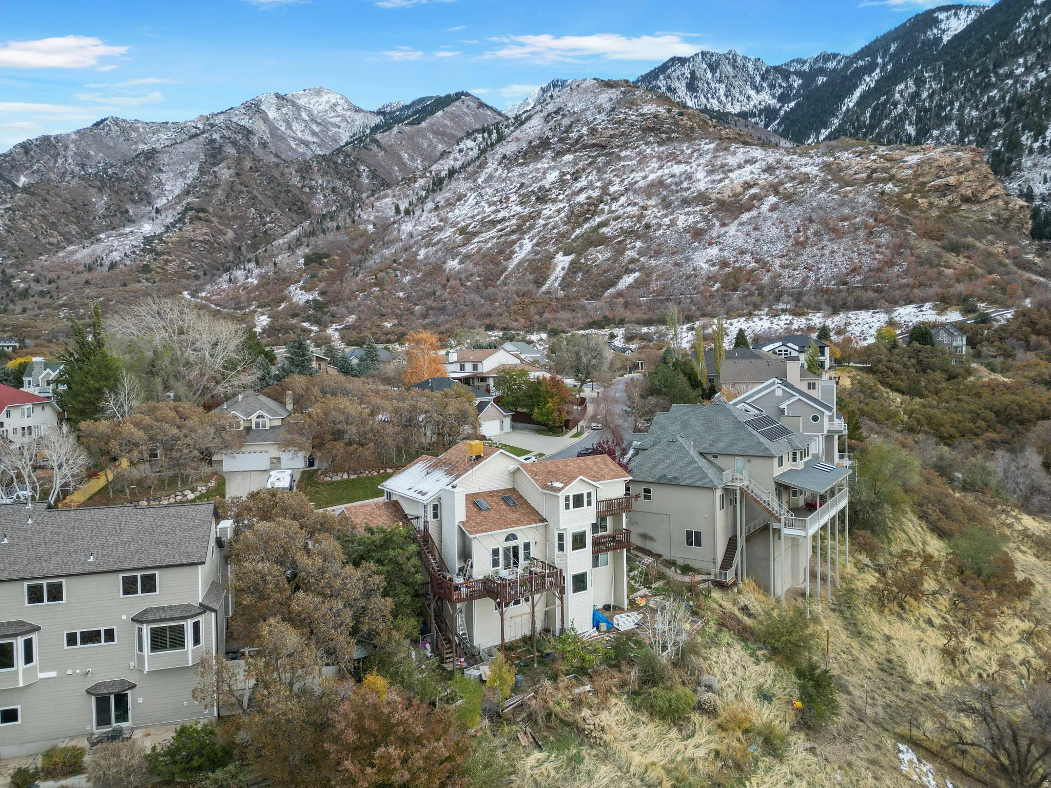 Aerial perspective showcasing a multi-level residence with expansive rear decks