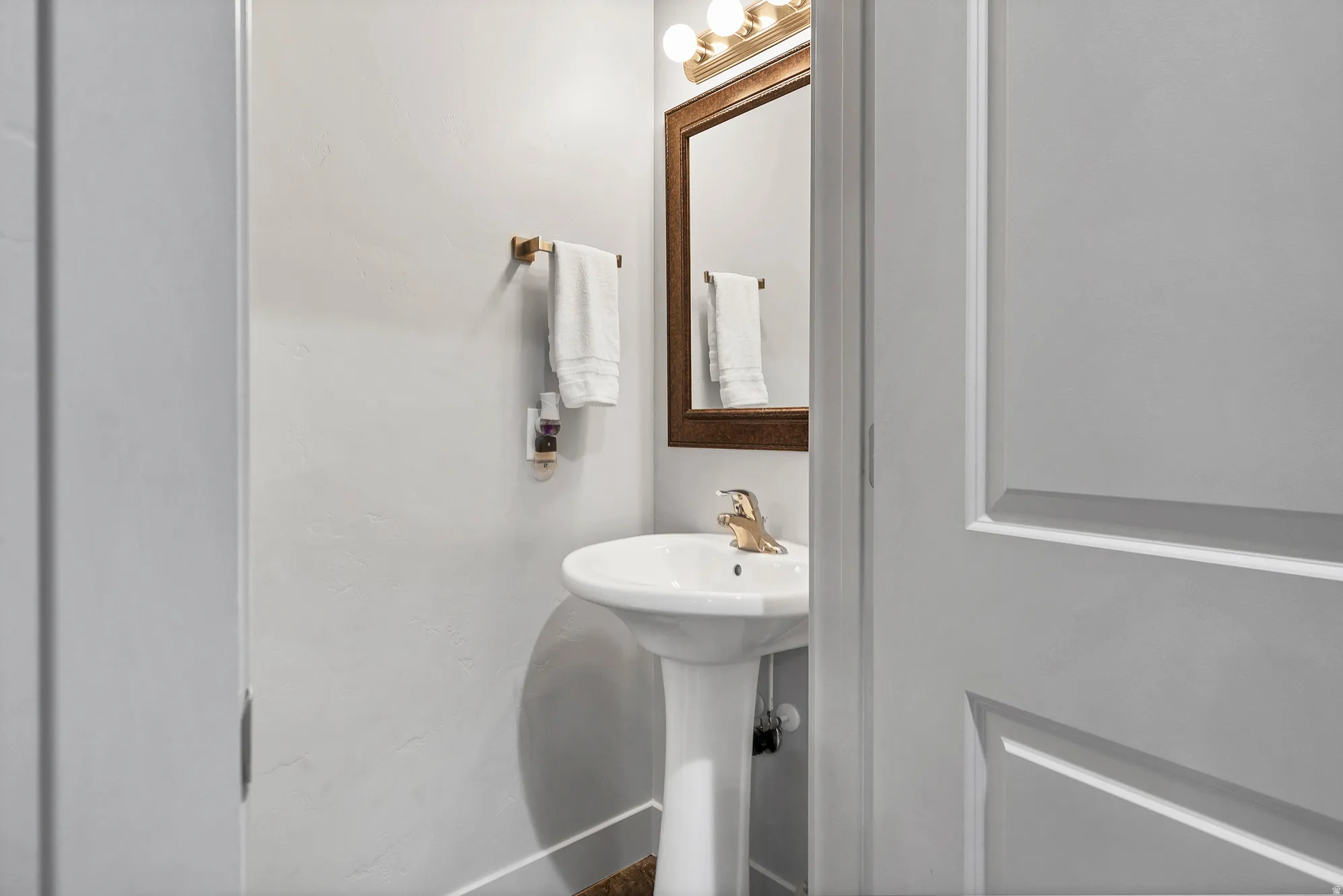 1/2 bath across from laundry