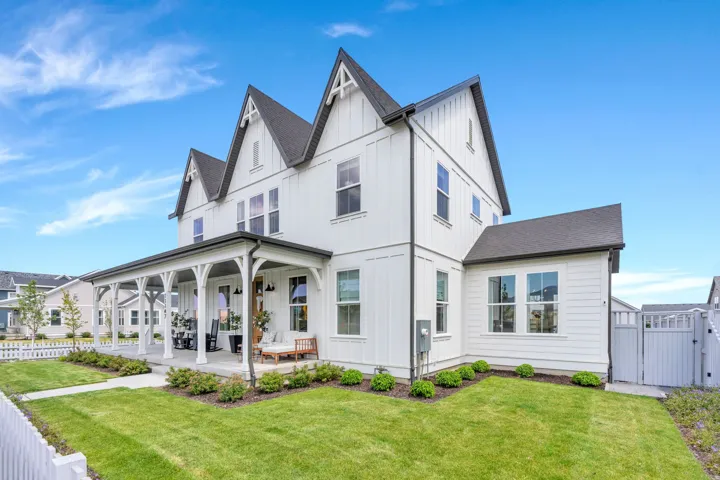 Modern farmhouse exterior featuring white board-and-batten siding