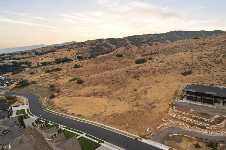 Expansive undeveloped lot presenting a mountainous backdrop
