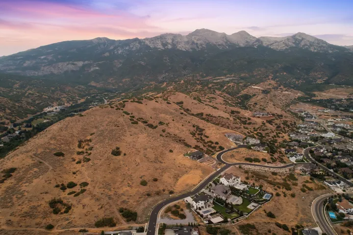Expansive mountain range backdrop and surrounding foothills