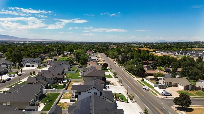 Aerial depiction of a residential neighborhood with varied architectural styles
