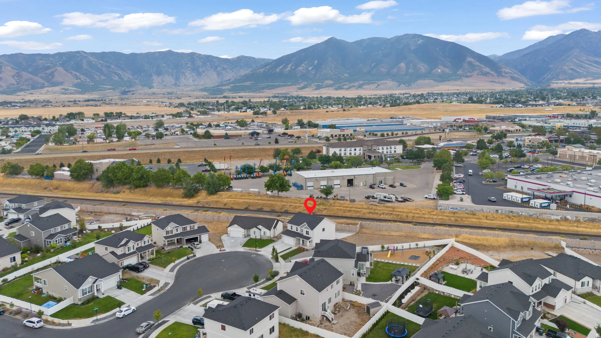 Modern residential development with mountain scenery