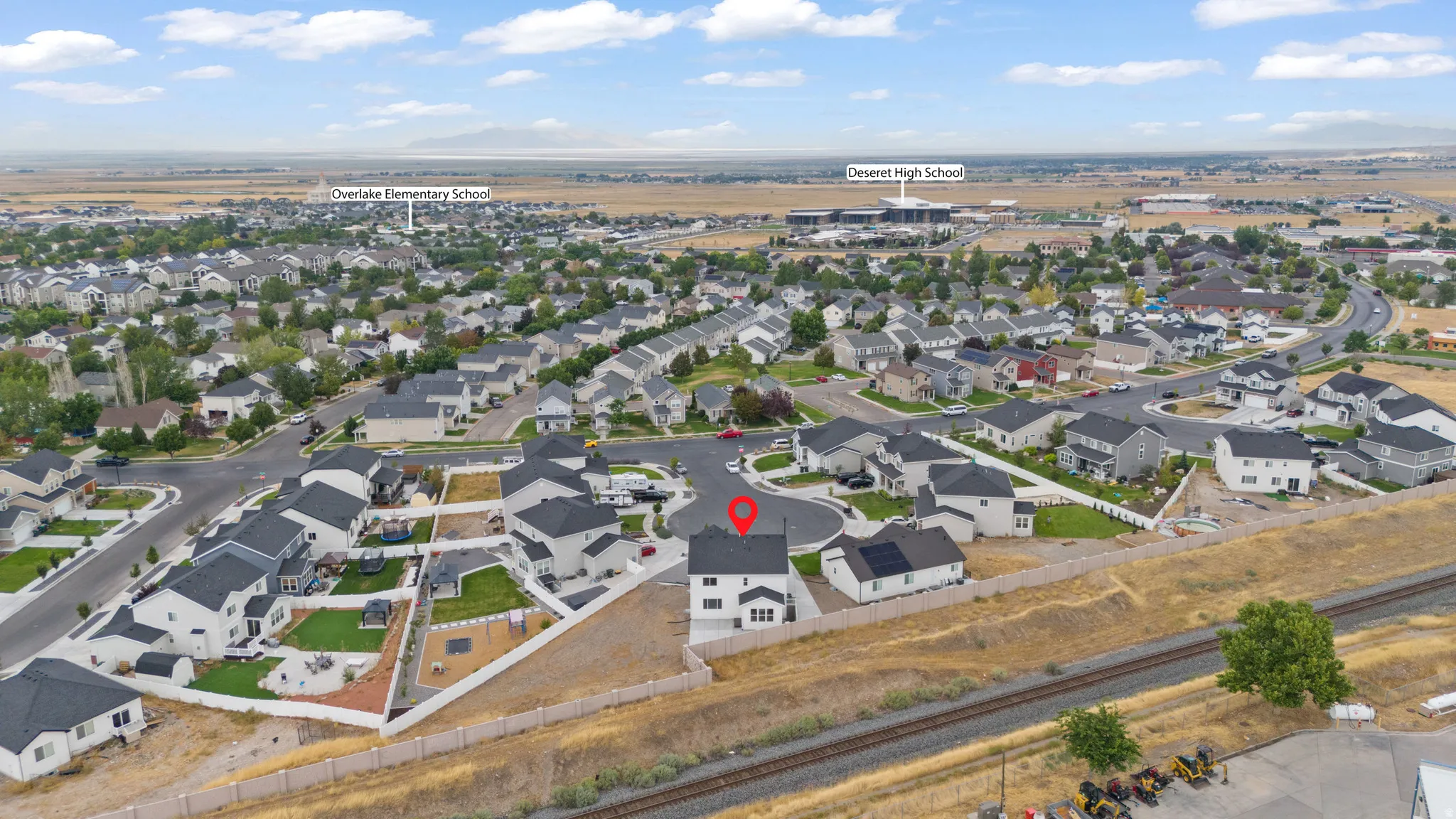 Aerial perspective showcasing a residential neighborhood with varied home styles