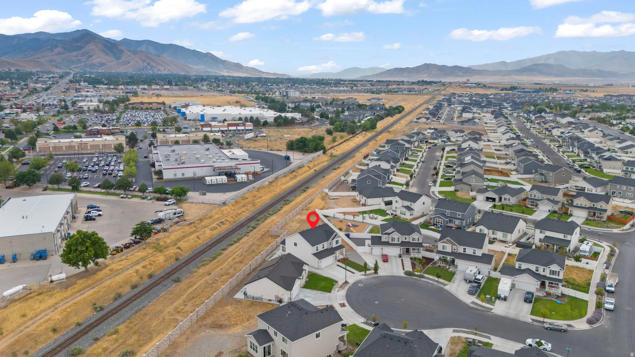 Residential property situated in a suburban development featuring a cul-de-sac