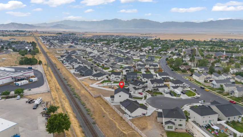 Aerial perspective highlighting a residential development with mountain backdrop