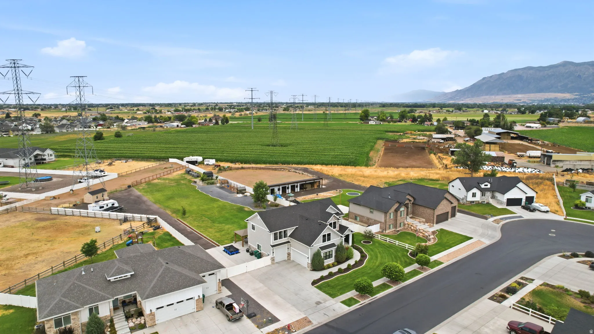 Aerial perspective showcasing residential properties with mountain backdrops
