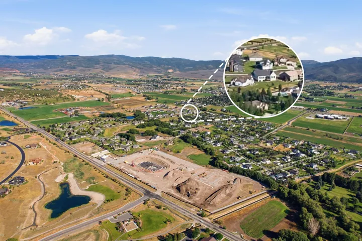 Aerial perspective highlighting a residential area with varied housing styles
