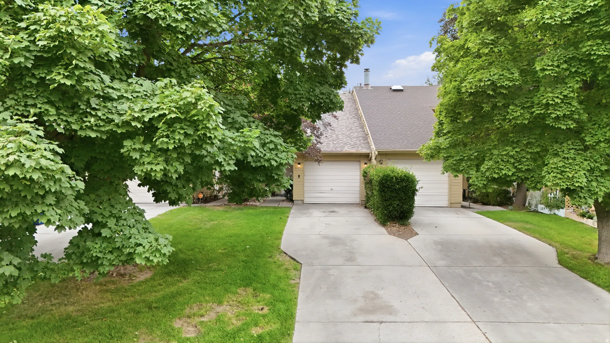 View of garage and parking.