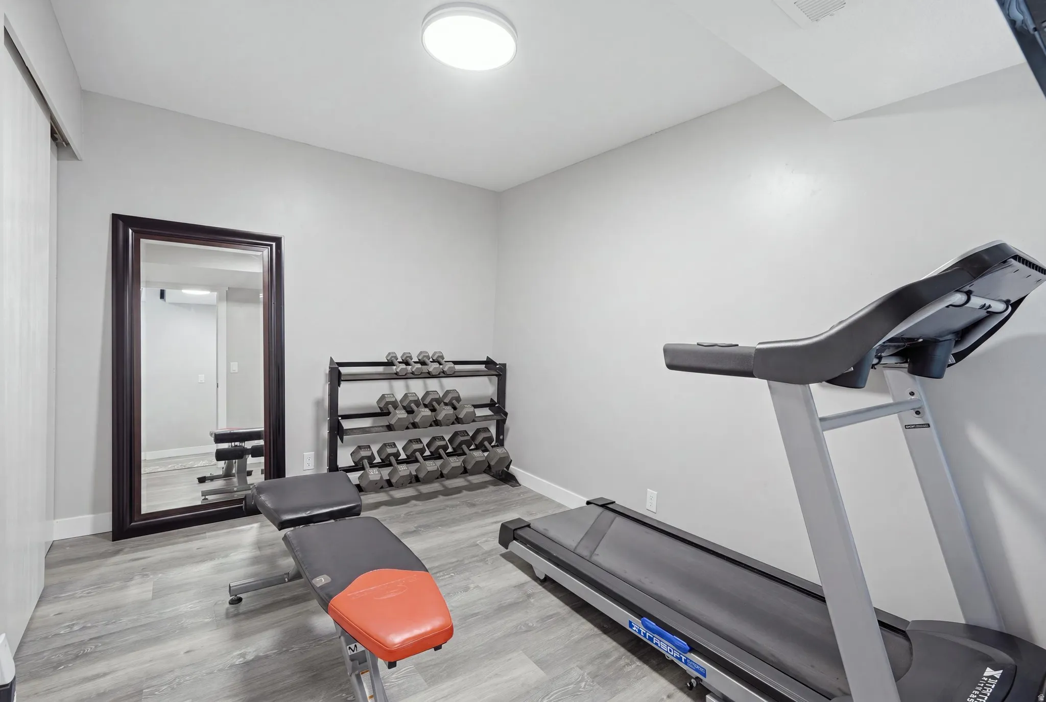 Bedroom 2 currently used as a home gym.