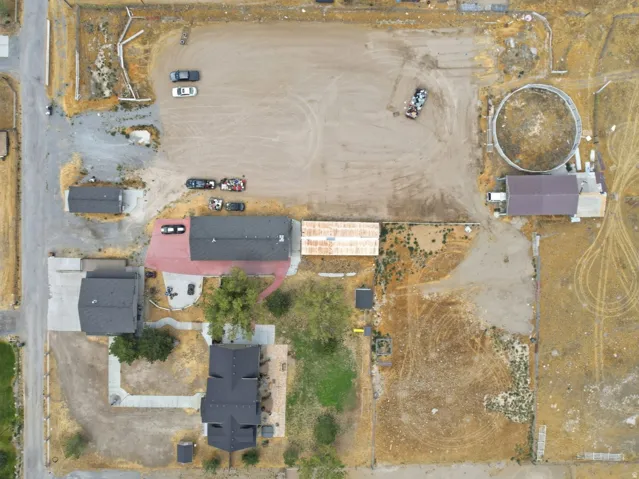 Expansive lot featuring multiple structures and significant undeveloped land