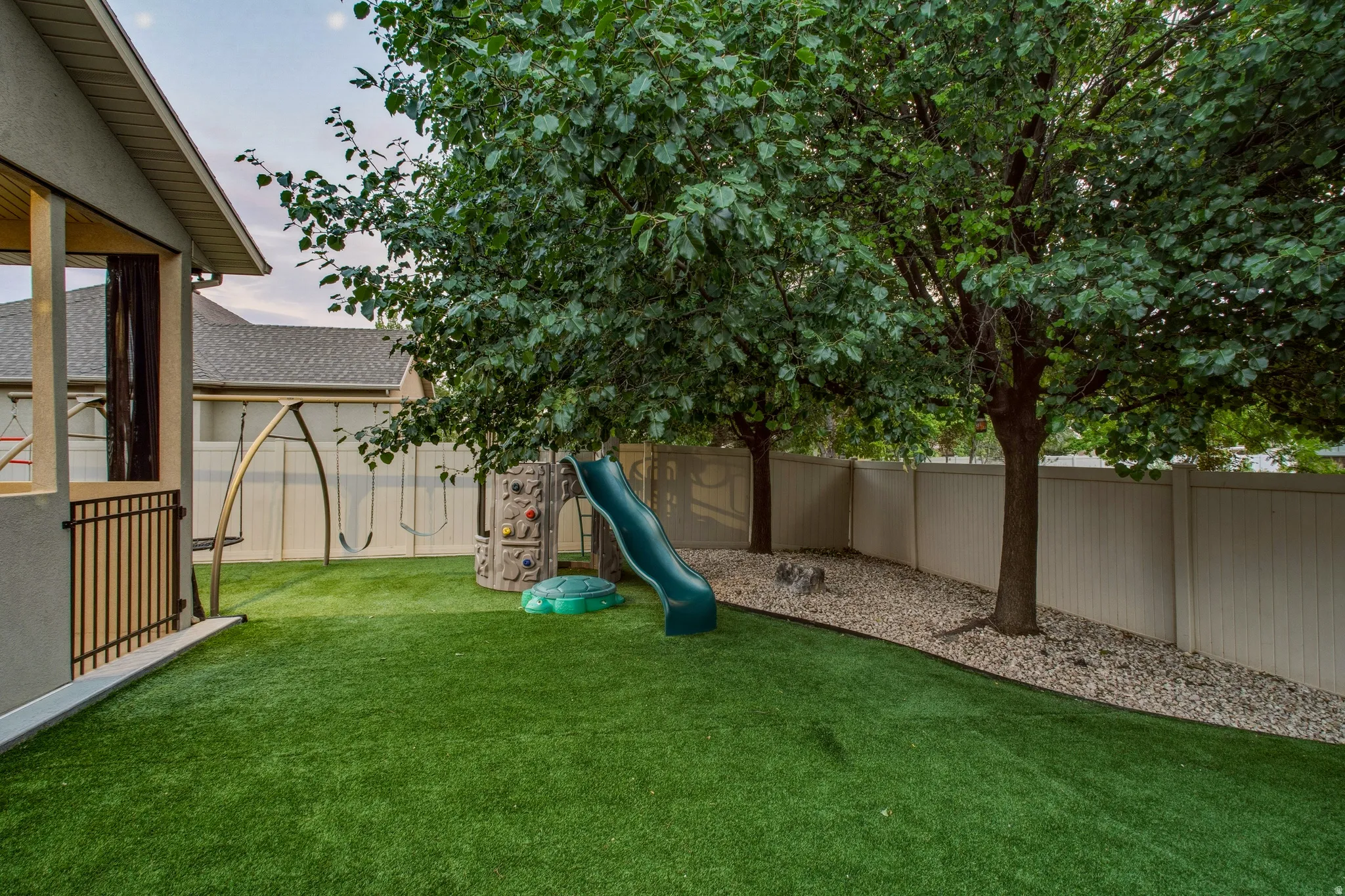 Beautiful Backyard with Shade/Privacy Trees and Playground Equipment