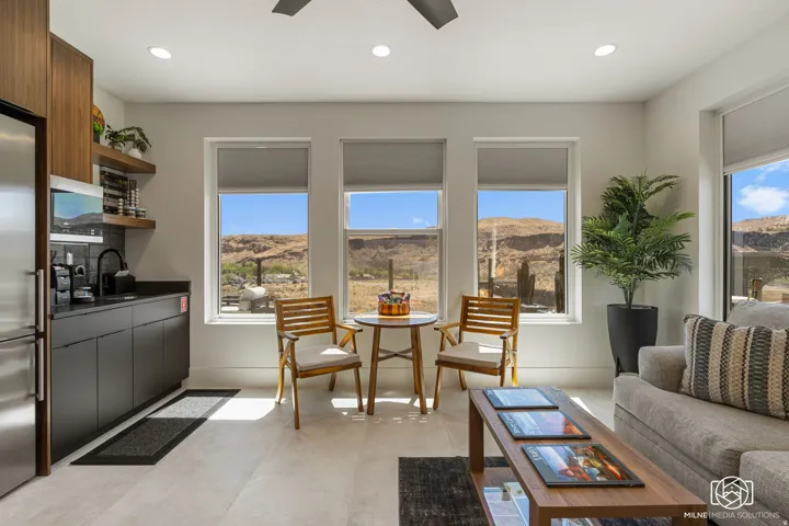 ADU open concept living area featuring light-toned flooring, recessed lighting, and a ceiling fan