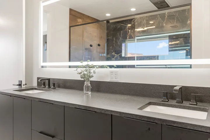 Dual vanity with stone countertop and integrated sinks