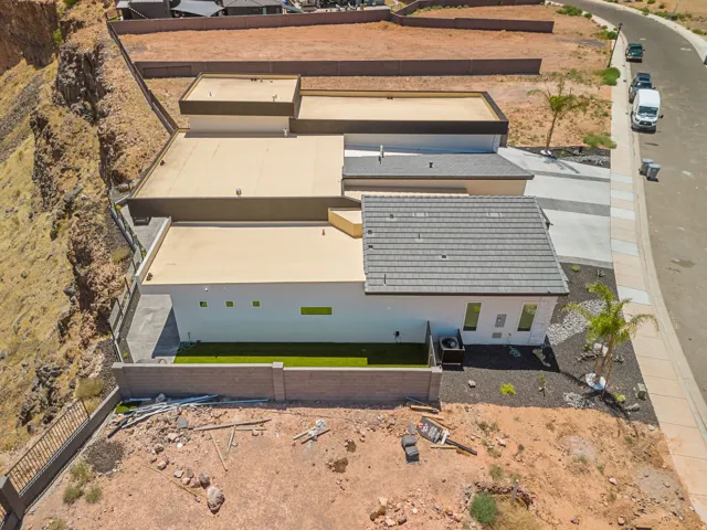 Modern architecture featuring a combination flat and pitched roofline