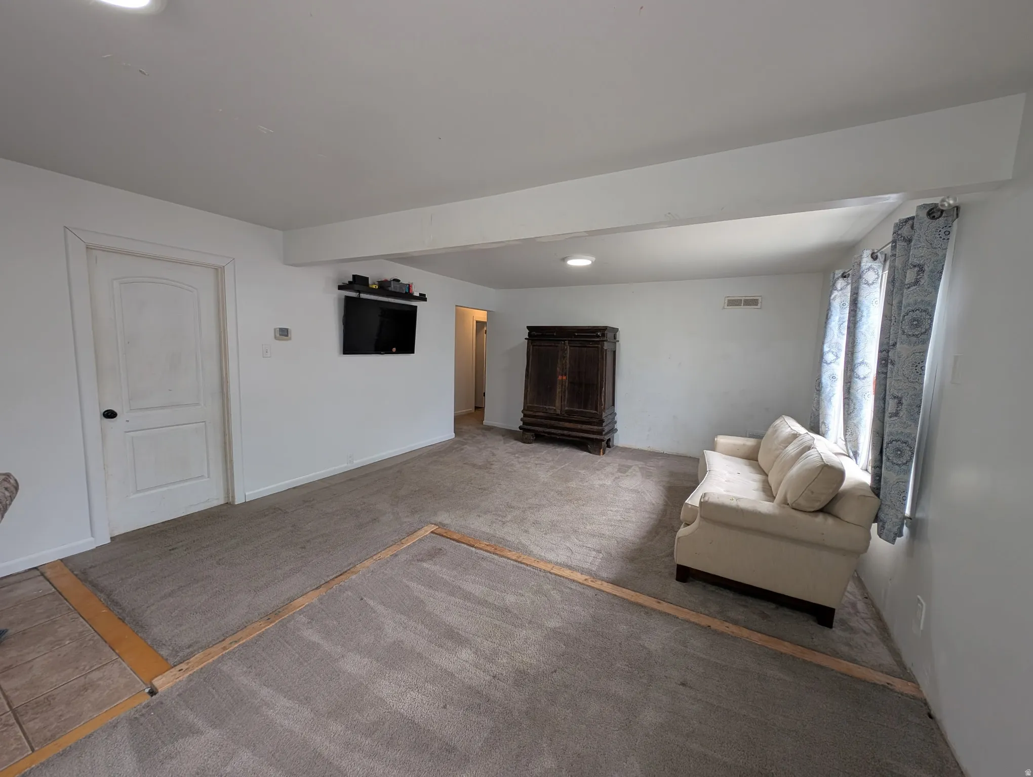 Recessed lighting illuminates the interior space