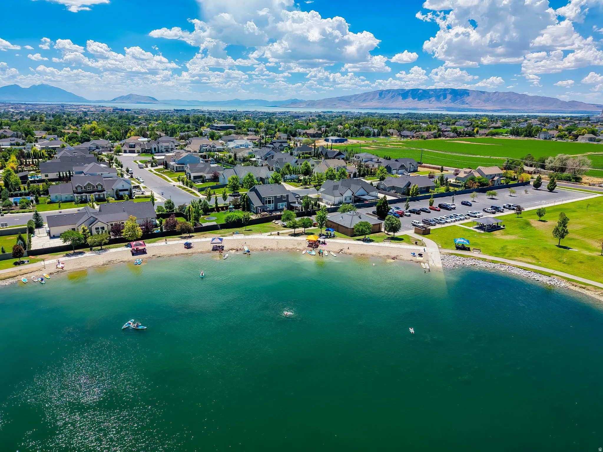 Aerial perspective showcasing a structured residential area with lake access