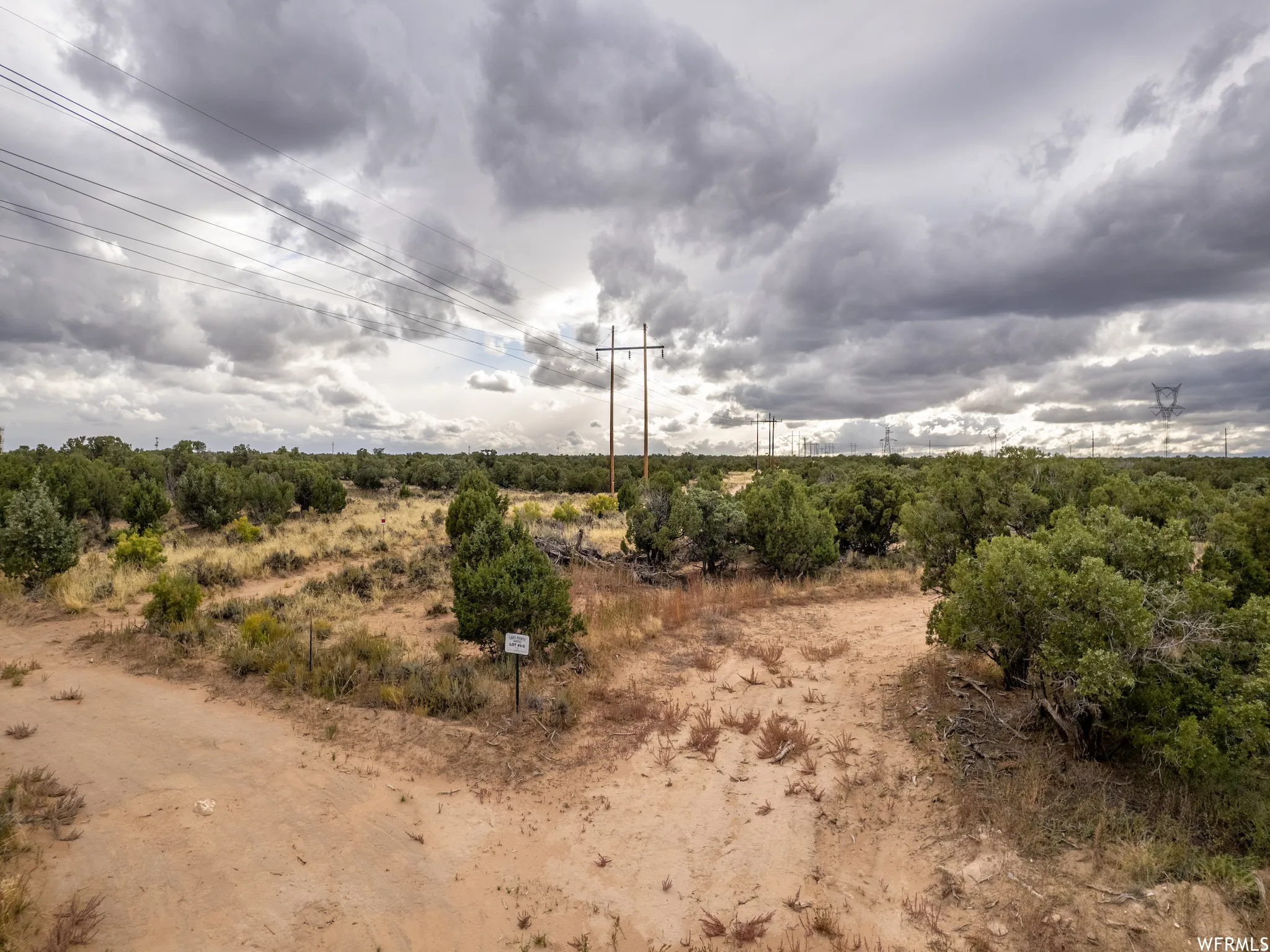 Expansive undeveloped land featuring natural vegetation and open terrain