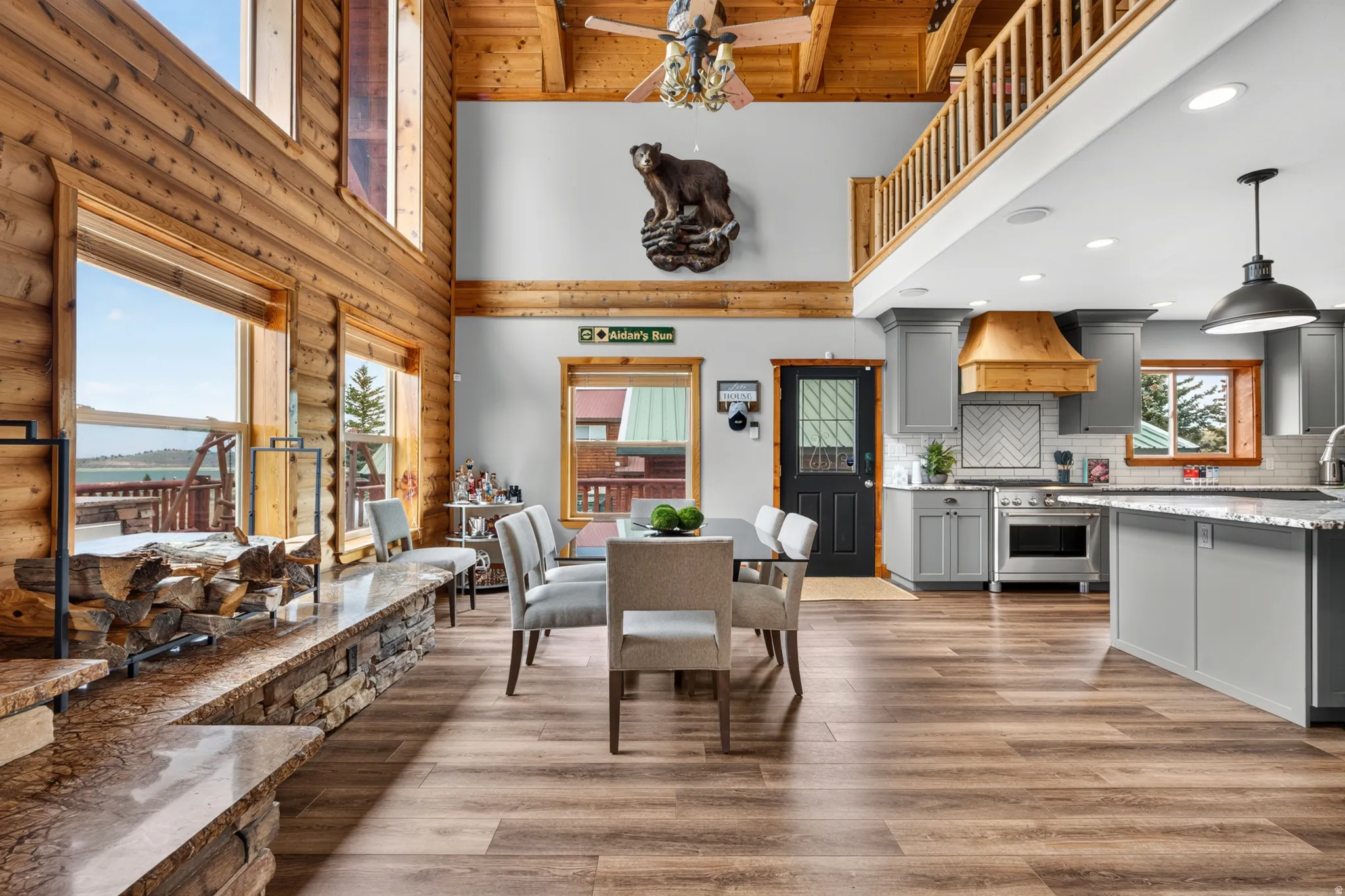 Open-concept living space with wood-finish flooring