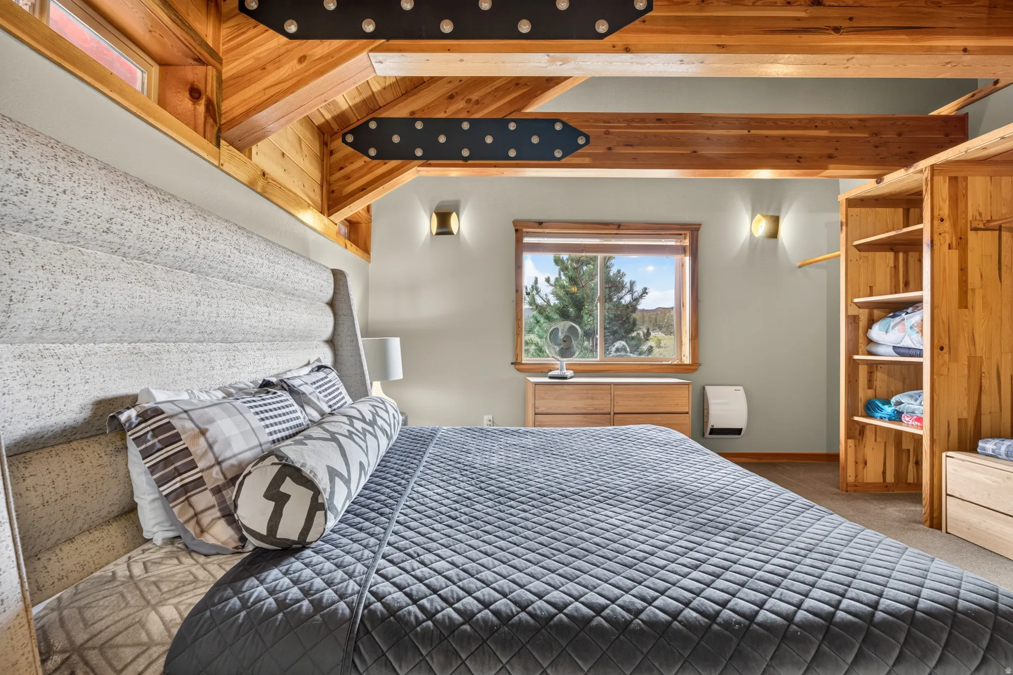 Vaulted wood-paneled ceilings featuring exposed beams