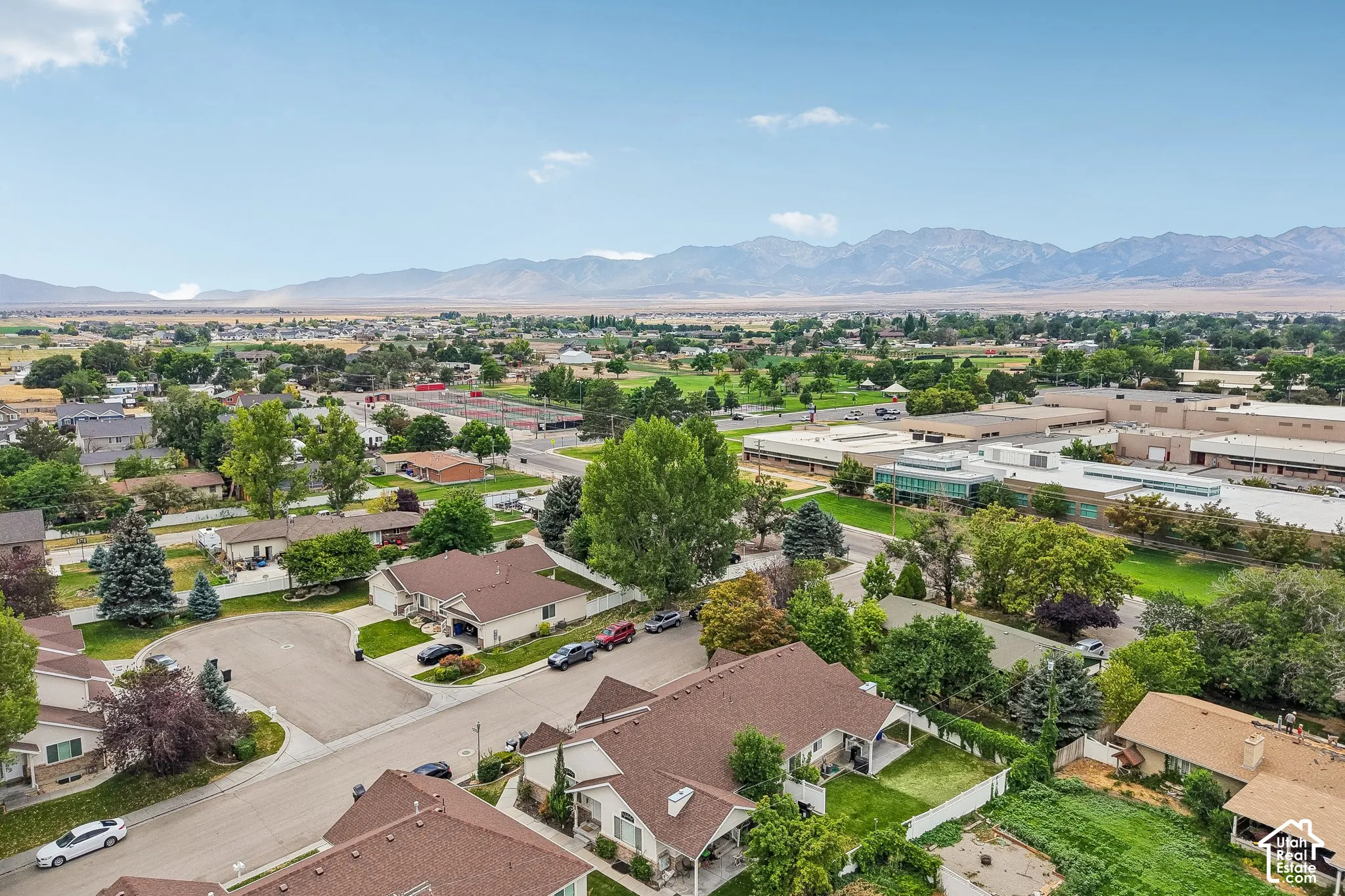Expansive residential neighborhood with distant mountain ranges