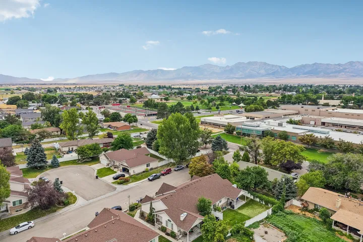 Expansive residential neighborhood with distant mountain ranges