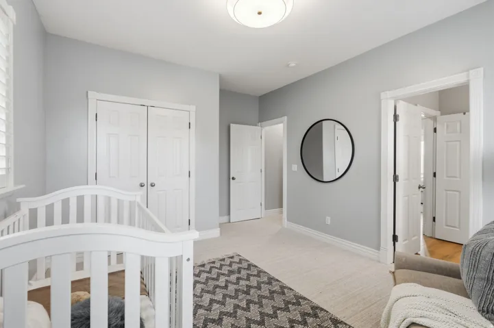 Bedroom #4--Double door closet offers generous hanging space along with convenient built-in shelving.