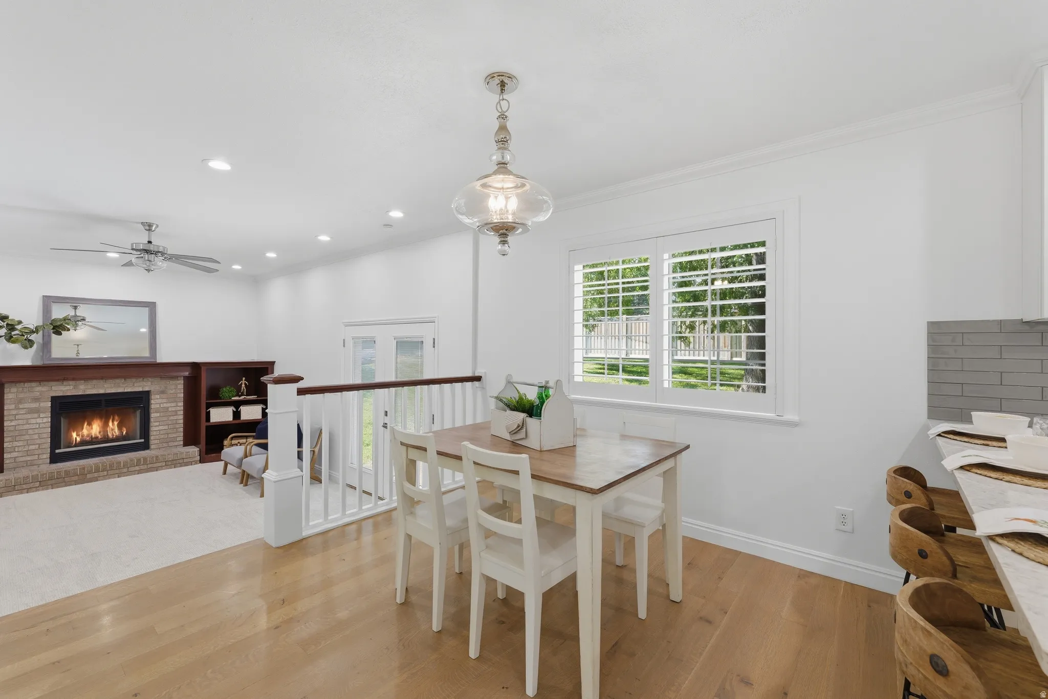 Dining area with hardwood flooring abundant natural light