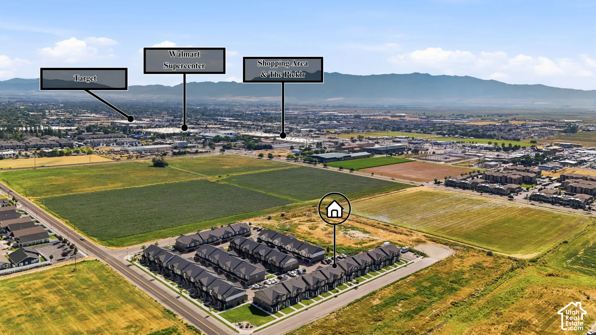 Aerial overview showcasing a residential development with structured rows of properties