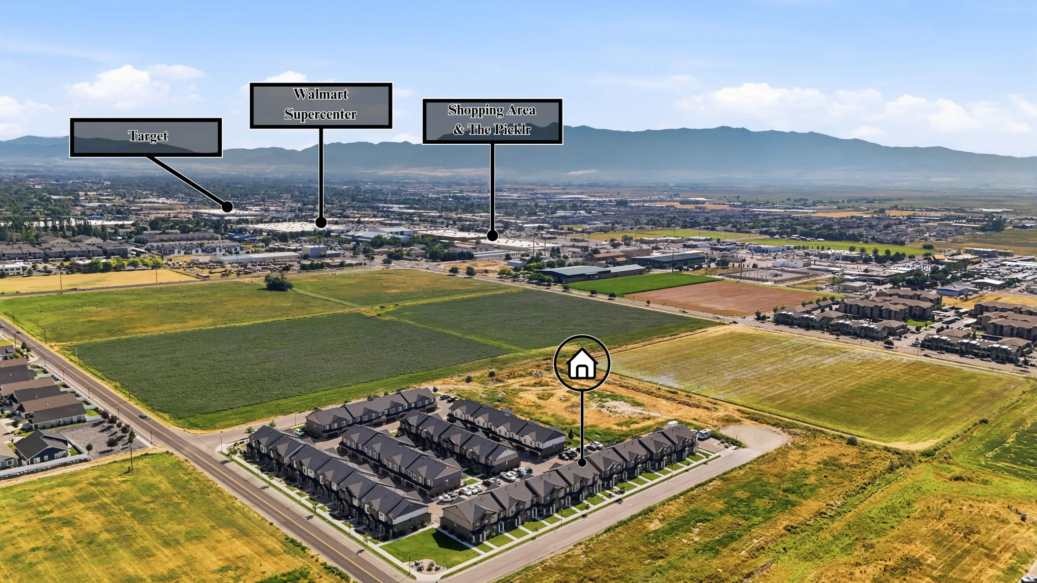 Aerial overview showcasing a residential development with structured rows of properties