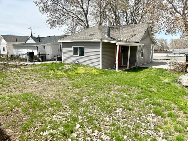 Exterior showcasing horizontal siding and a covered porch entry