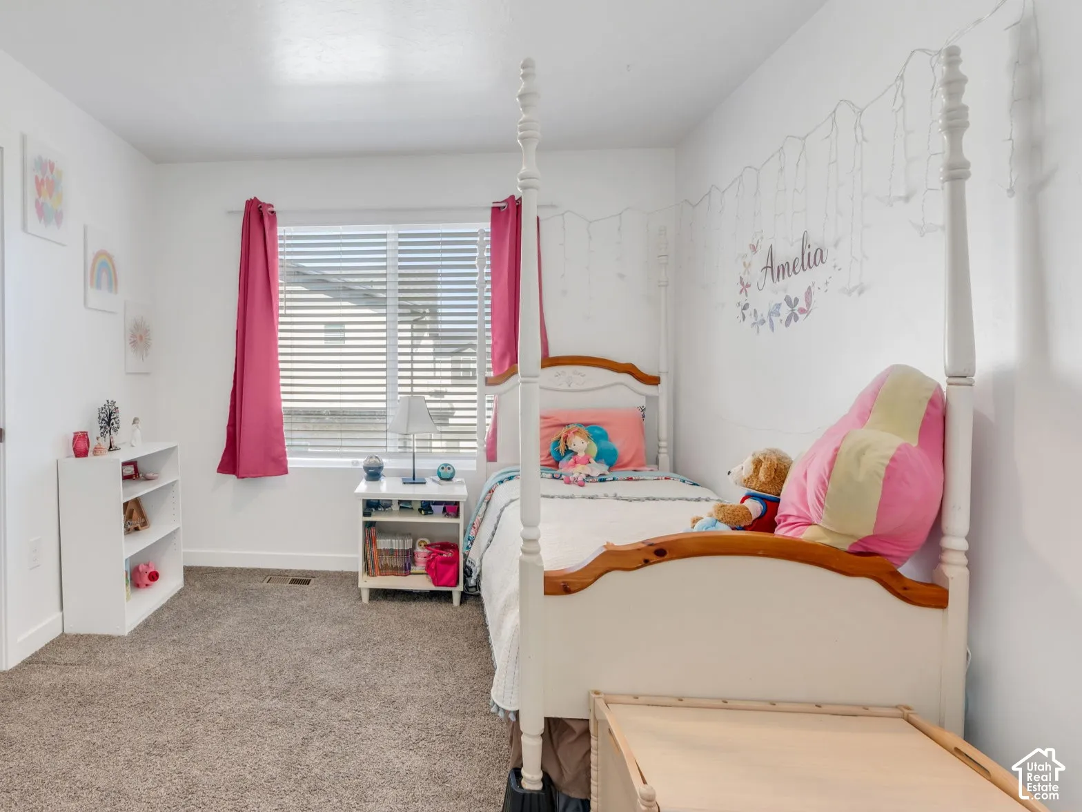 White walls, carpeted flooring, window with blinds, recessed lighting