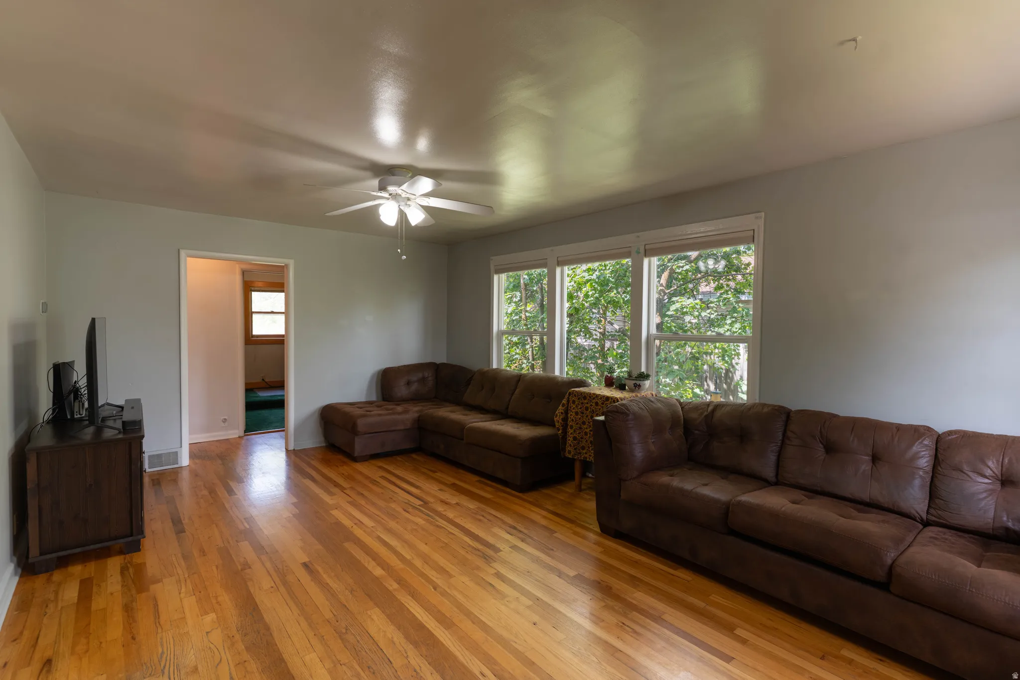 Walk into original wood floors, and great windows!  This is a bright, sunny room