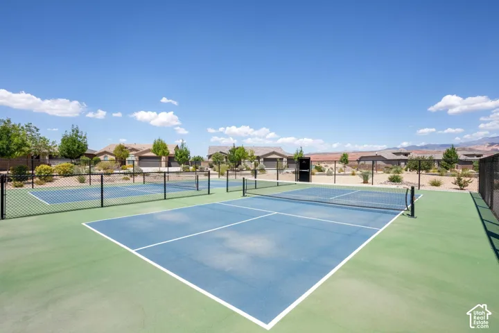Multiple outdoor courts featuring blue and green surfacing