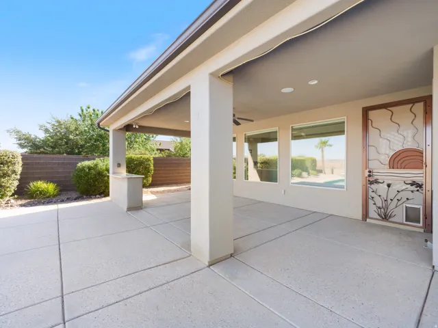Spacious covered patio with concrete flooring, recessed lighting, and a ceiling fan