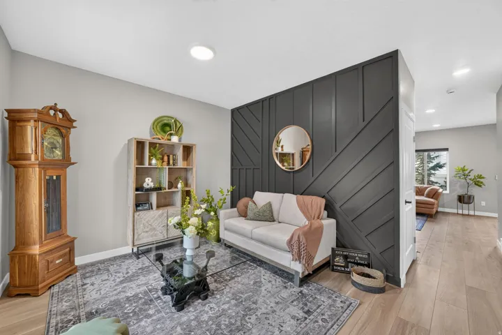 Accent wall featuring dark, geometric wall paneling
