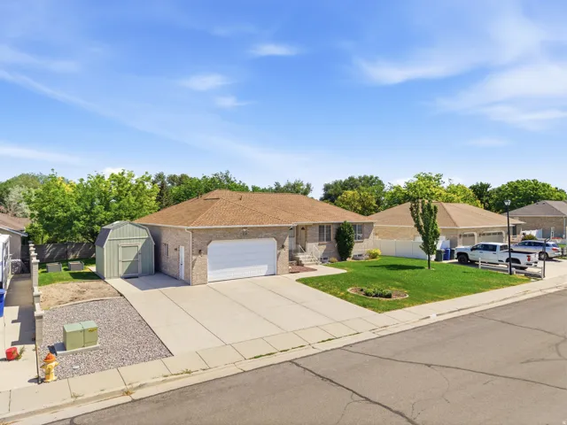 Brick exterior with an attached two-car garage