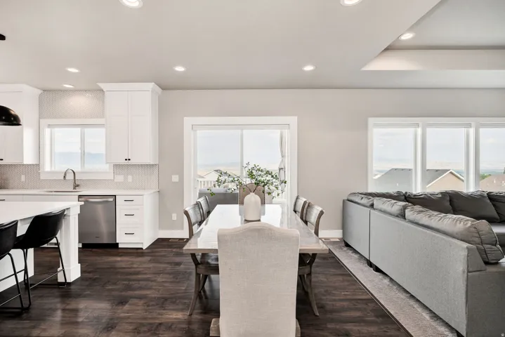 Open-concept living space featuring wood-finish flooring