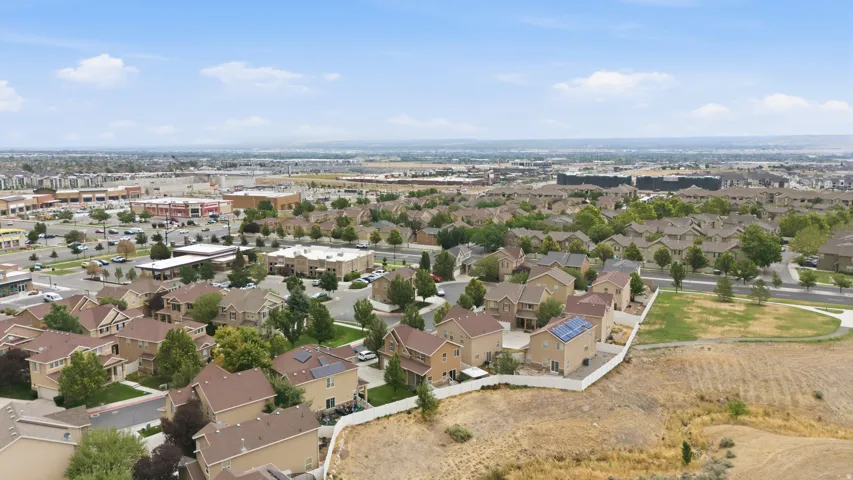 Aerial perspective showcasing residential properties within a developed community