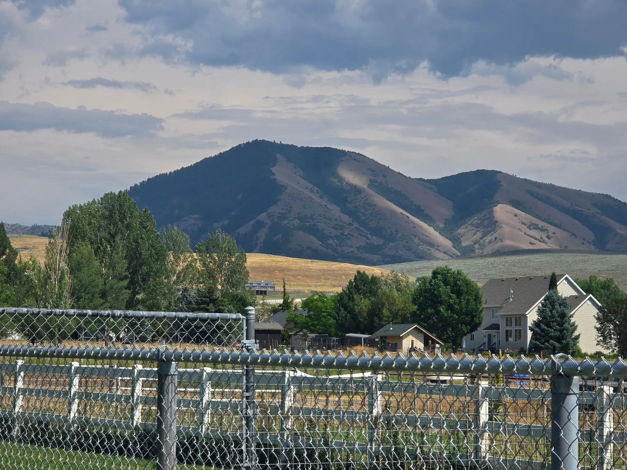 Distant mountain range backdrop featuring rolling hills