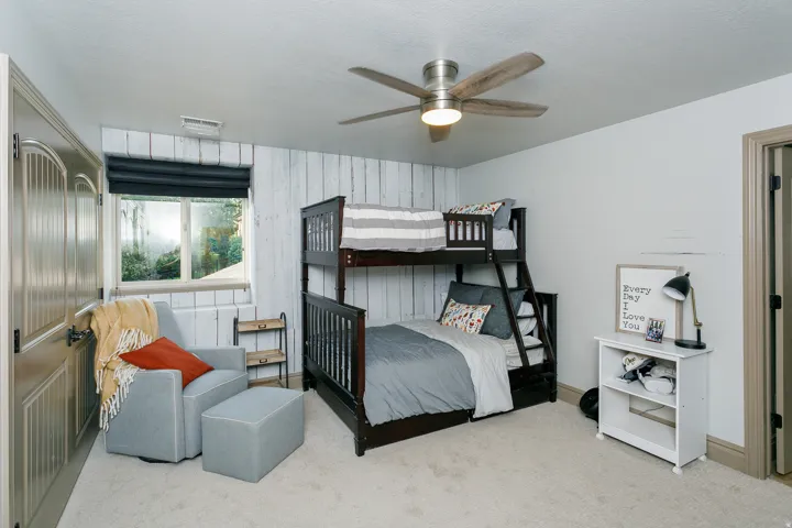 Interior room featuring light-toned carpeting and neutral wall paint