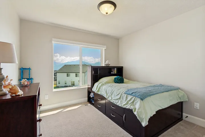Neutral tone wall paint with a white baseboard