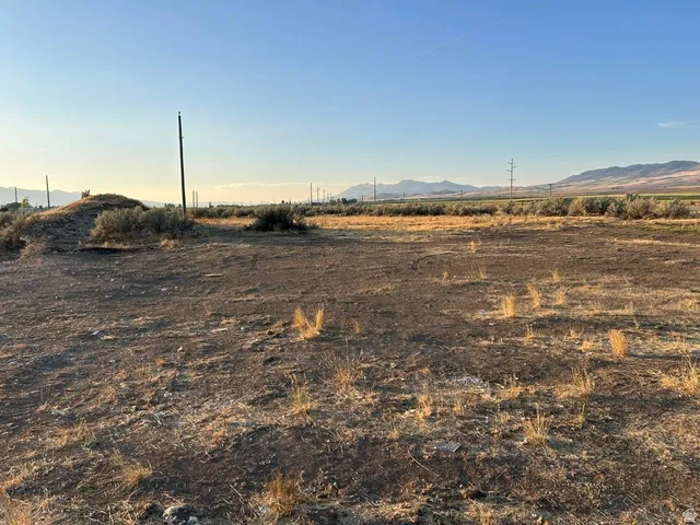 Expansive open land featuring a clear, flat topography