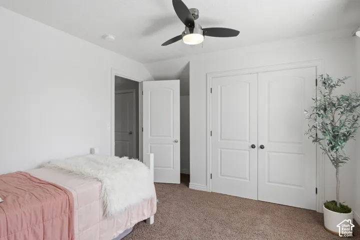 Slanted ceilings on either side give character to this cozy bedroom.
