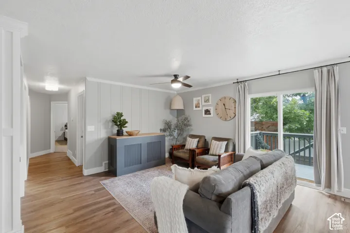 Back doors connected to the living room lead to a cozy covered porch.